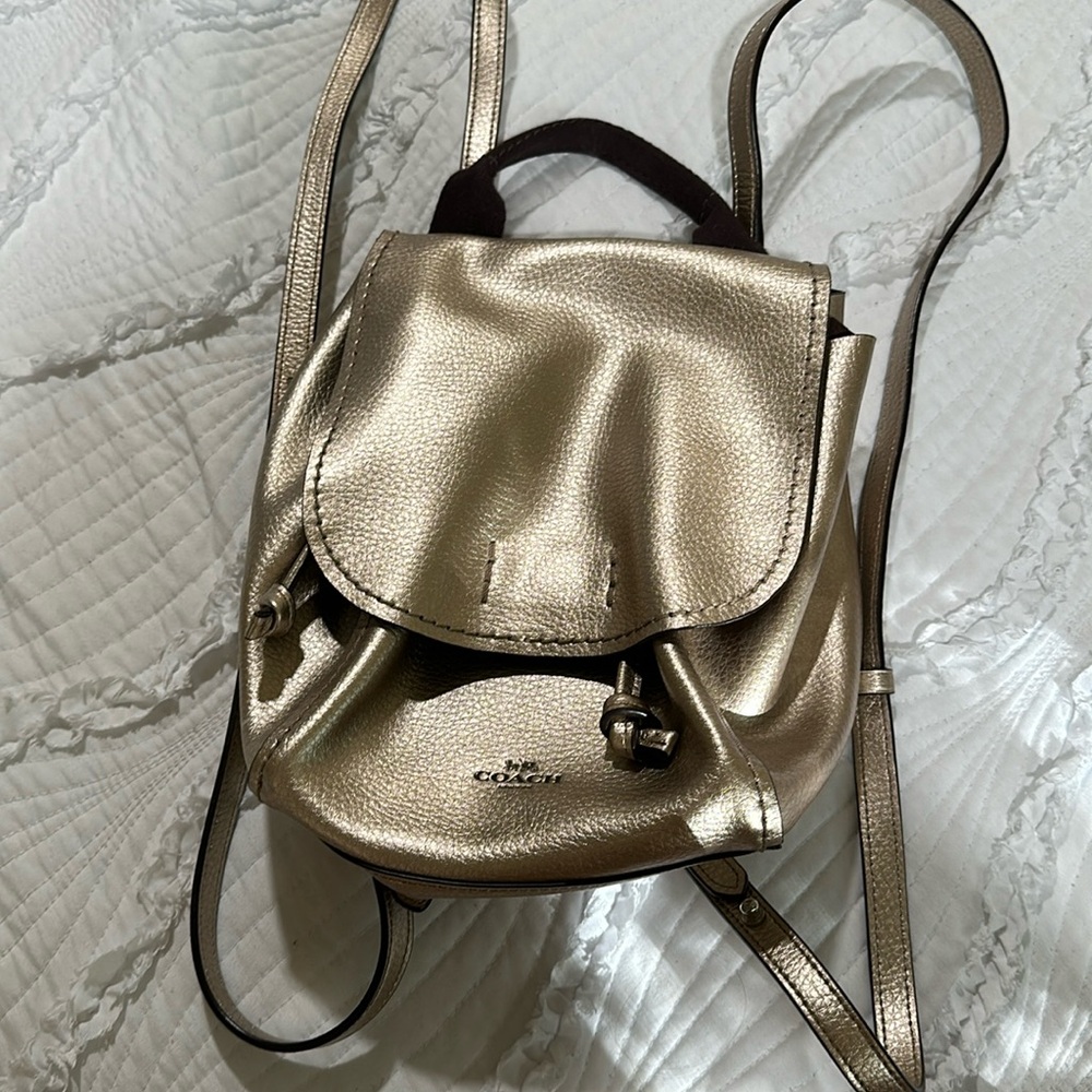 Like new shiny gold Coach bag